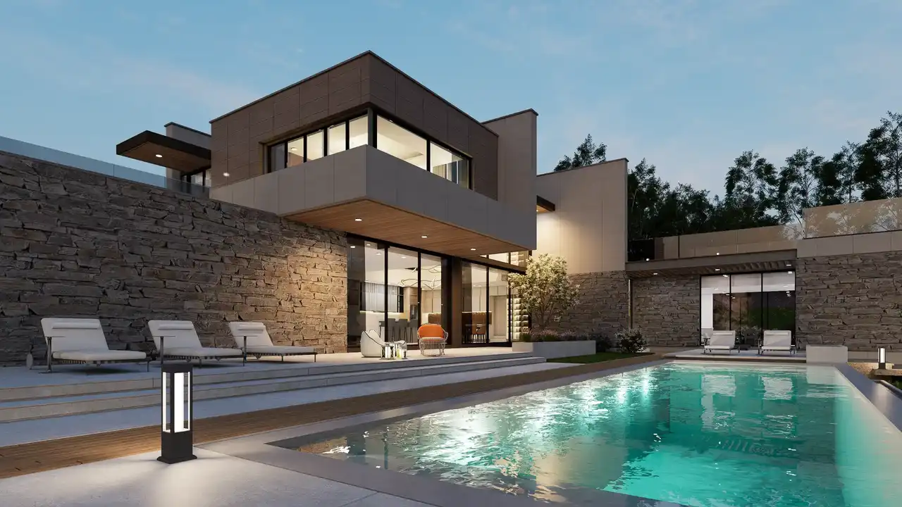 Rendering serale di una villa moderna su più livelli
              con piscina illuminata in primo piano. L'edificio presenta un piano terra rivestito in pietra naturale e volumi superiori a sbalzo con ampie vetrate. — Feoviz